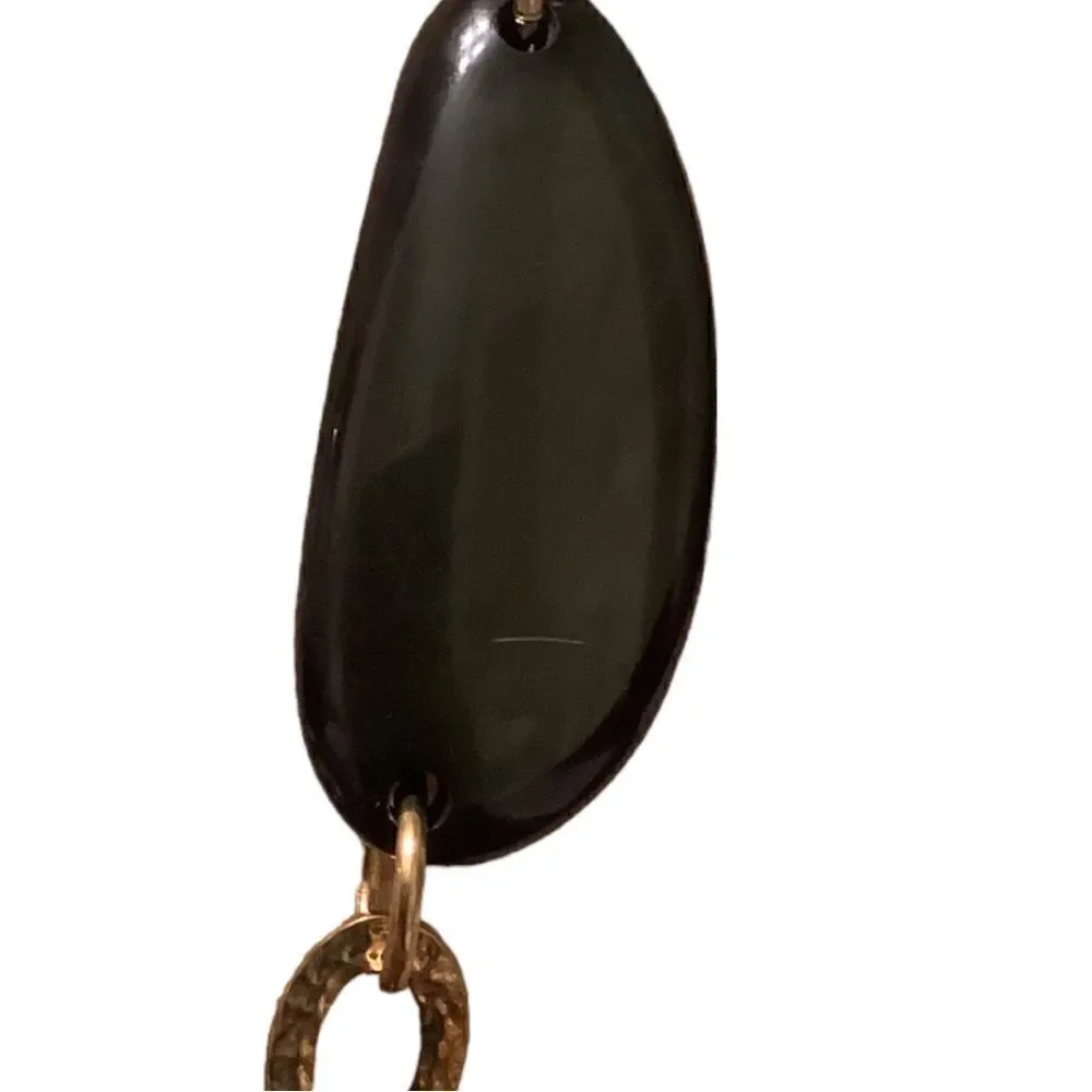 Gold tone necklace with oblong green stones. NWOT